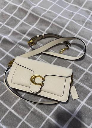 Оригінальна бежева сумка від coach