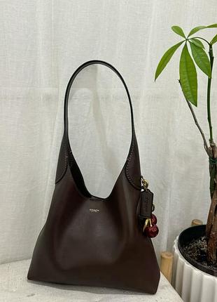 Coach brooklyn 28 - сумка-мешок. классический коричневый