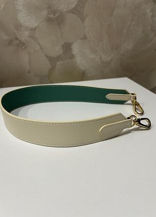 Короткий ремінець на сумку