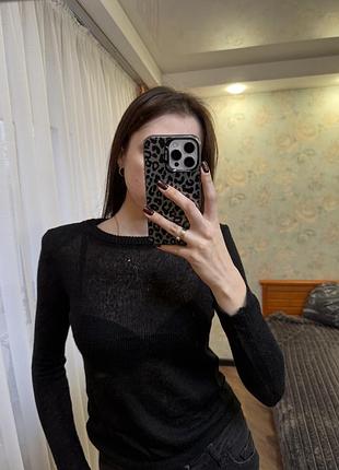 Напівпрозора кофтина з акцентними плечима