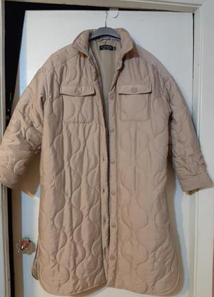 Пальто стеганое теплое.