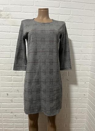 Жіноча тепла трикотажна сукня в клітинку