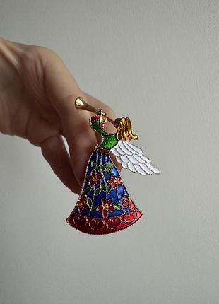 Металева брошка різдвяний янгол з трубой