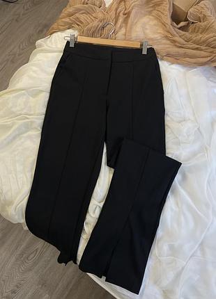 Чорні кльош штани