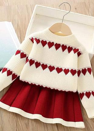 Вʼязаний костюм