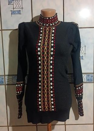 Свитер с высоким воротником и выглядкой gallery