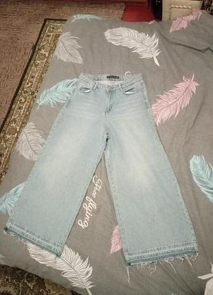 Джинсы женские широкие