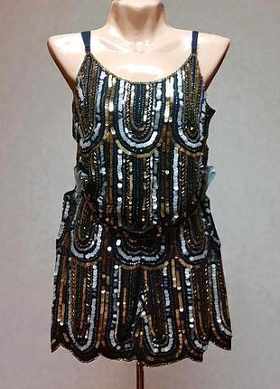 Блискучий костюм шорти і майка паєтки