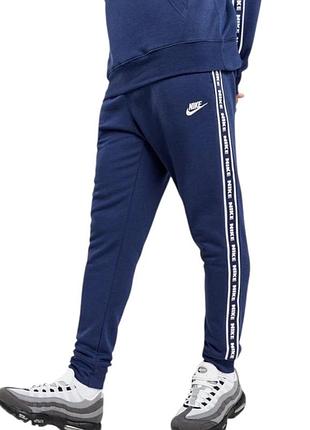 Спортивні штани з лампасами nike