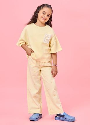 Детские желтые джинсы палаццо в цветочек на 3-4роки