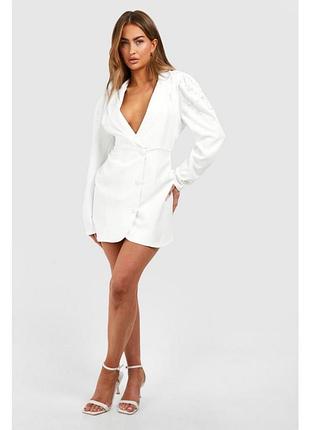 Жіноча неймовірна біла сукня-піджак з широкими рукавами і розрізом на нозі