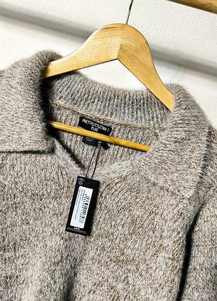 Свитер меланжевий поло в'язаний