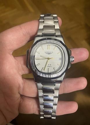 Чоловічий механічний годинник longlux nautilus сріблястий з металевим браслетом