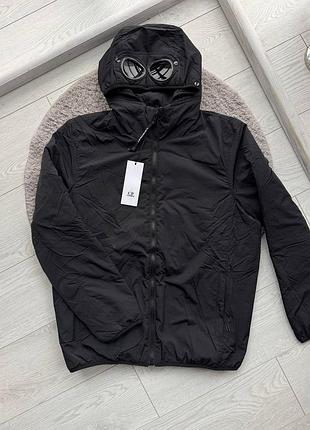 Микропуховик cp company goggle jacket