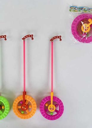 Каталка-колесо 8901 в (192/2) 3 вида, трещотка, с ручкой, в кульке