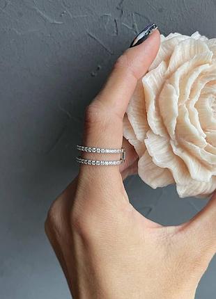 Срібна подвійна каблучка з фіанітами, дві риски страз 18.5