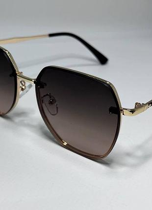 Окуляри сонцезахисні жіночі мультиманти з лінзами градієнт у металевій оправі коричневий