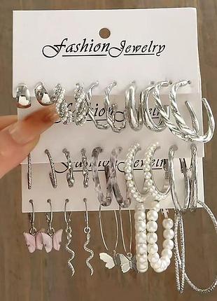 Набор из 15 среблястых серьг