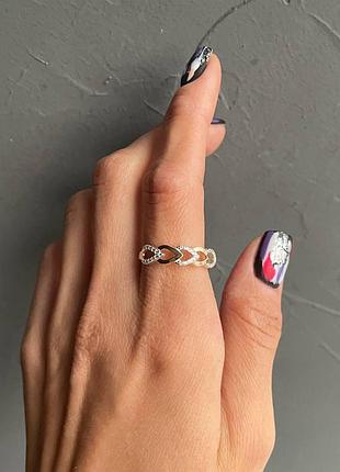 Серебряное кольцо с золотыми пластинами и фианитами 18.5