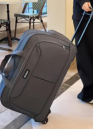 Большая плотная дорожная сумка с колесами с отделением для обуви и телескопической ручкой на 48 литров