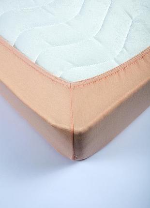 Простынь трикотажная на резинке 160х200 персиковый