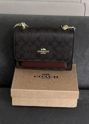 Жіноча сумочка coach mini klare crossbody коричневий