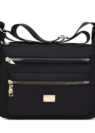 Жіноча чорна сумка нейлонова на плече