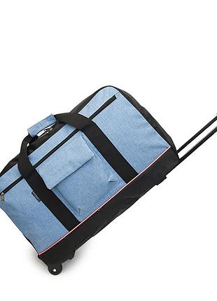 Большая плотная дорожная сумка с колесами вместительная с телескопической ручкой синяя 64 литра