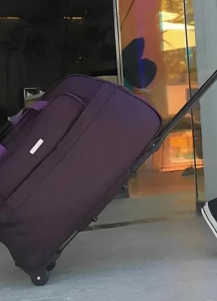 Большая дорожная сумка на колесах вместительная плотная с телескопической ручкой водонепроницаемая 55 литров