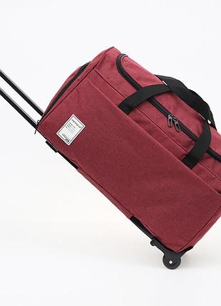 Большая дорожная сумка на колесах плотная с телескопической ручкой вместительная красная 45 литров