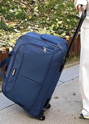 Большая вместительная дорожная сумка с колесами для путешествий с телескопической ручкой на 48 литров
