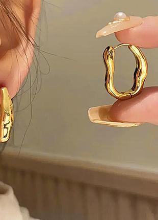 Сережки жіночі золотистого кольору