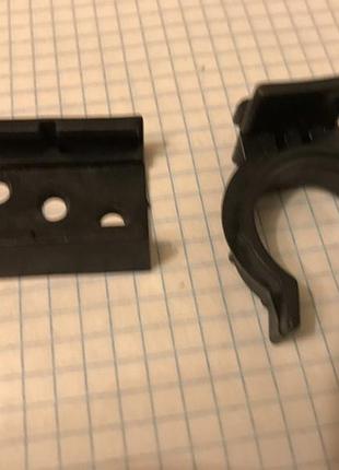 Клипса для ножки кухонной пластиковой.