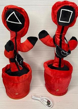 Танцующий охранник из сериала игра в кальмара