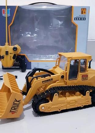 Бульдозер іграшка на пульті управління