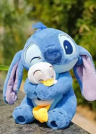 Милая плюшевая игрушка стич с уточкой