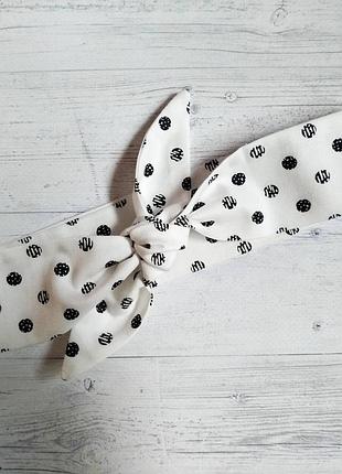 Пов'язка дитяча на голову солоду біля в чорних горох