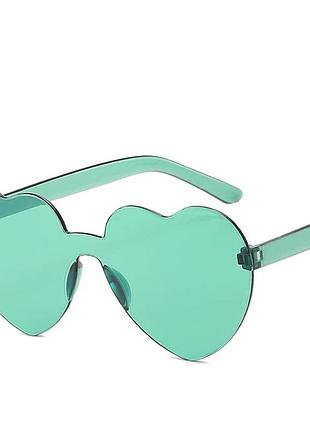 Стильні безоправные сонцезахисні окуляри у формі серця зелений