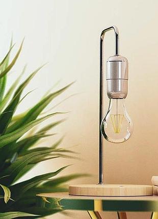 Антигравитационный настольный светильник (левитирующий). серебряный.