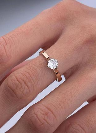 Серебряное кольцо с золотом и фианитами