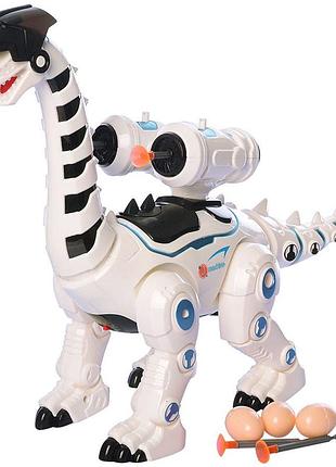 Дитяча іграшка робот дінозавр стріляє стрілами на присосках і несет яйця