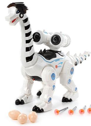 Робот динозавр игрушка стреляет стрелами и несет яйца