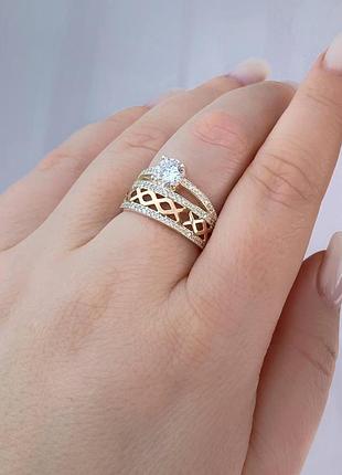 Серебряное кольцо с золотом и фианитами