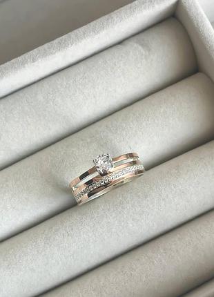 Серебряное кольцо с золотом и фианитами