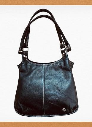 Шкіряна вмістка сумка