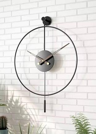 Настінний годинник в металевому корпусі з маятником чорний діаметр 60 см