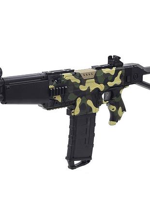 Дитяча іграшка автомат на акумуляторі стріляє м'якими кулями на присосках