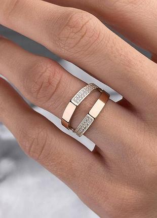 Серебряное кольцо с золотом и фианитами