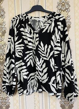 Легка чорно-біла кофтинка блуза