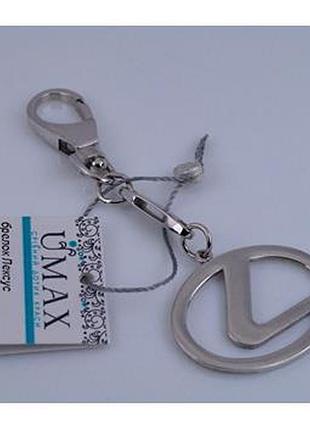 Брелок для ключей серебряный "лексус" 925 пробы.
